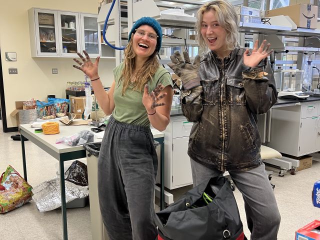 Indra and Laura organizing rope into bags