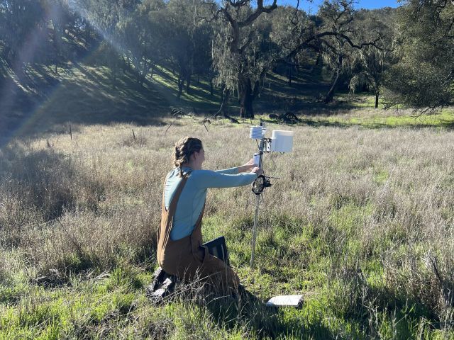 Michaela working on tipping rain gauge, relative humidity, and light sensor